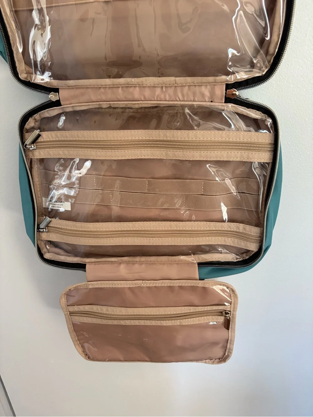 Teal Bagsmart quilted hanging travel toiletry bag